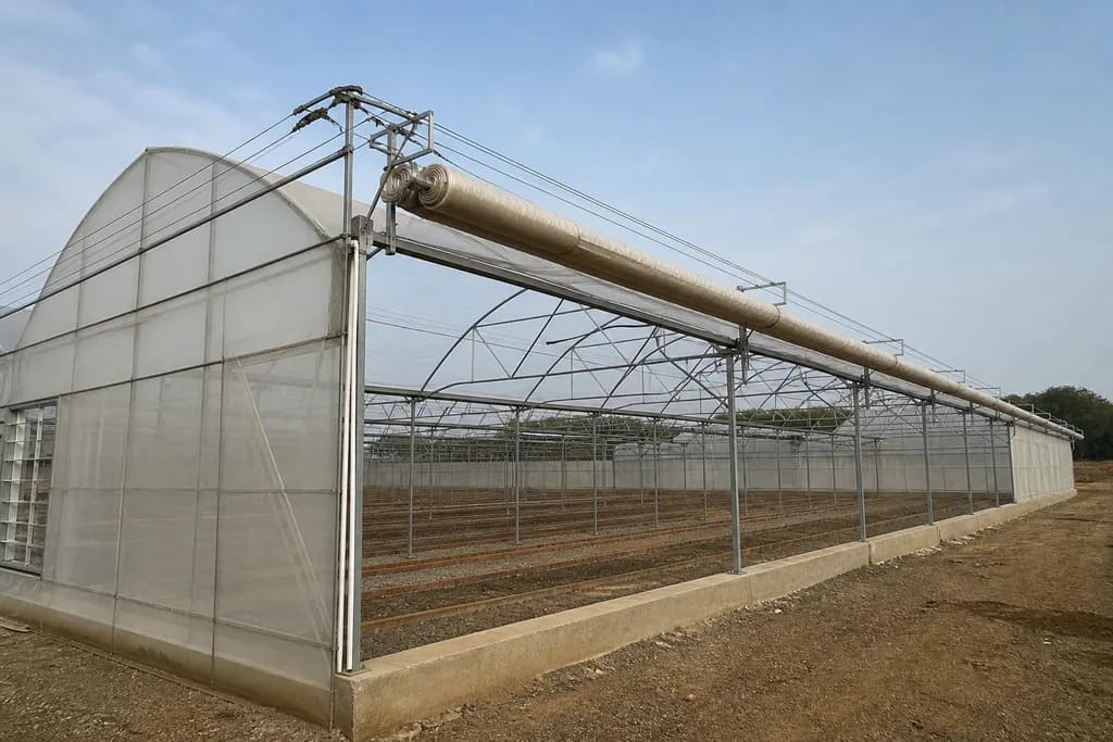 Illustrative rendering of a retractable-roof greenhouse with the roof partially open.